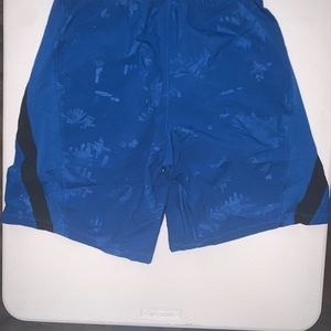 Dark blue Under Armour swim trunks